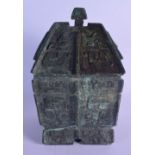 A LARGE CHINESE BRONZE CENSER AND COVER 20th Century, decorated with archaic motifs and foliage. 33