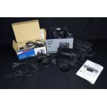 A collection of cameras & equipment including Canon, Olympus & Panasonic. (Qty)