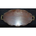 An antique wooden and brass balustrade tray. 53 x 29cm