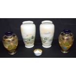 A pair of Japanese Kutani vases, together with two other Japanese vases depicting Mount Fuji and a s
