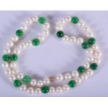 AN 18CT PEARL AND JADE NECKLACE. Length 42cm, pearls 6.7mm diameter, jade .1mm diameter