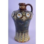 AN ANTIQUE DOULTON LAMBETH STONEWARE EWER decorated with flowers. 21.5 cm high.