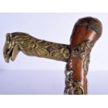 AN UNUSUAL VINTAGE MILITARY FOLK ART TYPE EAGLE HEAD WALKING CANE of almost cermonial axe head form.