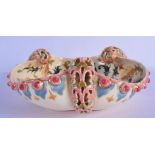 A 19TH CENTURY HUNGARIAN ZSOLNAY PECS TREFOIL FORM BOWL with reticulated handles. 24 cm wide.