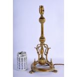 AN ART NOUVEAU BRASS CANDLESTICK LAMP in the manner of Benson. 40 cm high overall.