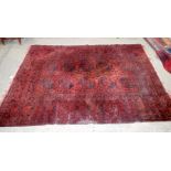 A large Persian rug 293 x 218cm