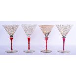 A STYLISH SET OF FOUR VINTAGE MURANO VENETIAN GLASSES overlaid with trailing vines and foliage. 19 c