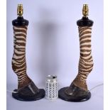 A LARGE PAIR OF 19TH CENTURY TAXIDERMY GIRAFFE FOOT LAMPS. 47 cm high.