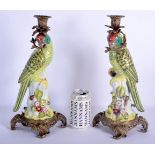 A LARGE PAIR OF CONTEMPORARY PARROT GILT METAL CANDLESTICKS. 36 cm high.