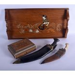 A 19TH CENTURY ANGLO INDIAN SANDALWOOD CASKET together with a similar tray and two kukri daggers. La