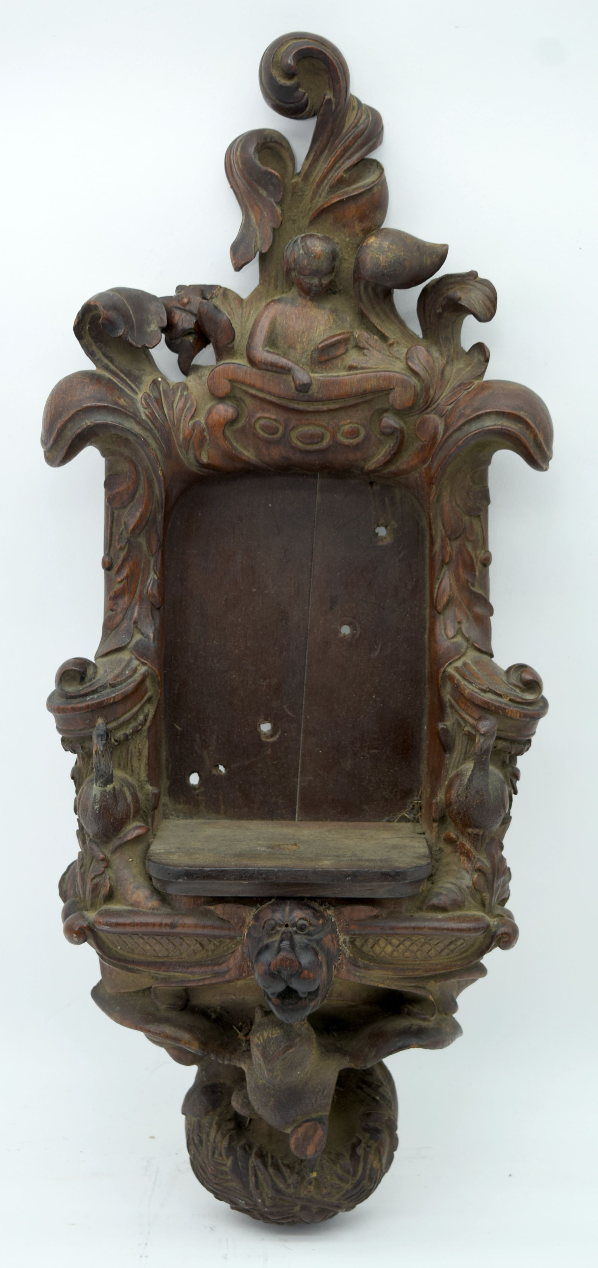 A 19th century carved black Forest wall mount signed with monogram 50 x 20cm