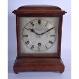 A SCOTTISH HAMILTON AND INCHES OF EDINBURGH MANTEL CLOCK with silvered dial. 20 cm x 15 cm.