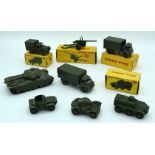 A collection of boxed and unboxed Dinky military models 13cm . (8)