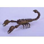 A JAPANESE BRONZE ARTICULATED OKIMONO IN THE FORM OF SCORPION. .8cm long x 4cm wide, total weight 4