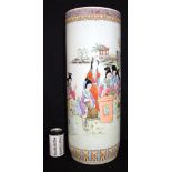 A large Chinese porcelain polychrome stick stand decorated with figures and calligraphy. 61cm