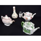 A collection of antique English teapots including Coalport, Masons & a lidded porcelain bottle. Larg