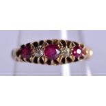 AN 18CT GOLD RING WITH INSET DIAMONDS AND GARNETS. Size M, weight 3.33g