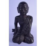 A LATE 19TH CENTURY THAI LACQUERED WOOD FIGURE OF A BUDDHA. 27 cm x 27 cm.