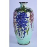 AN EARLY 20TH CENTURY JAPANESE MEIJI PERIOD CLOISONNE ENAMEL VASE decorated with foliage. 12 cm high