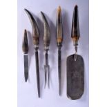 FIVE 19TH CENTURY CONTINENTAL CARVED BUFFALO HORN HANDLED TOOLS. Largest 27 cm long. (5)