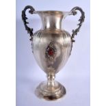 A LARGE EARLY 20TH CENTURY TWIN HANDLED SILVER VASE inset with agate. 1047 grams. 34 cm x 22 cm.