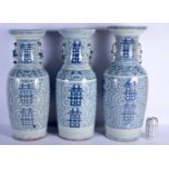 THREE LARGE 19TH CENTURY CHINESE BLUE AND WHITE PORCELAIN VASES Qing, painted with foliage and shou