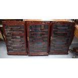 A SET OF THREE EARLY 20TH CENTURY CHINESE HARDWOOD SNUFF BOTTLE DISPLAY CABINETS Late Qing/Republic.