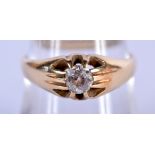 AN 18CT GOLD AND DIAMOND RING. Size P, weight 3.57g