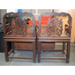 A SET OF THREE 19TH CENTURY CHINESE CARVED HARDWOOD DRAGON ARMCHAIRS Qing, decorated with buddhistic
