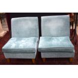 A pair of Delcor low fabric armchairs. 78 x 75 x 67 cm
