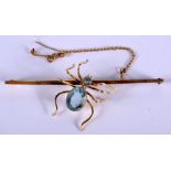 A 9CT GOLD AND AQUAMARINE SPIDER BROOCH. 6.4cm x 2.8cm, weight 4.26g