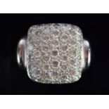 AN 18CT WHITE GOLD AND DIAMOND CLUSTER RING. Size N, weight 7g