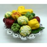 A large continental porcelain bowl of fruit 21 x 37cm.