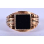 A VICTORIAN STYLE 9CT GOLD AND BLACK STONE RING. Size W weight 13.37g