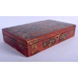 A REGENCY COUNTRY HOUSE RED LACQUERED BOX AND COVER containing numerous George III and later gaming
