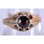 A 9CT GOLD AND RUBY RING. Size O, weight 2.7g