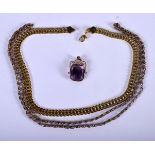 AN 18K GOLD CHAIN TOGETHER WITH ANOTHER AND A PENDANT. Gold chain 39cm Long, weight 21.5g (3)