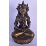 AN 18TH/19TH CENTURY CHINESE TIBETAN FIGURE OF A SEATED BUDDHA modelled holding a tibetan stupa. 17