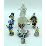 A collection of continental porcelain figures Napkin rings, cups etc 15cm (10).