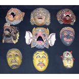 A collection of South eastern Asian masks (9).