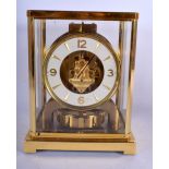 A BOXED JAEGER LE COULTRE BRASS ATMOST CLOCK. 21 cm x 18 cm.