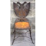 A metal butterfly backed garden chair 105 x 43cm.