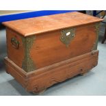 A 19TH CENTURY INDONESIAN MADURA BLANKET CHEST ON WHEELS overlaid with brass fittings. 100 cm x 68 c