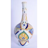 A TURKISH OTTOMAN KUTAHYA FAIENCE TYPE BOTTLE NECK VASE painted with flowers and motifs. 28 cm high.