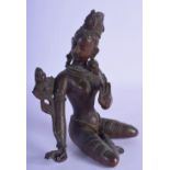 A 19TH CENTURY INDIAN BRONZE FIGURE OF A SEATED FEMALE modelled holding a trailing flower with one h