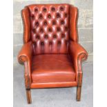 George III style wing back leather chair 96 x 65 x 68 cm.