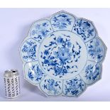 A RARE LARGE EARLY 18TH CENTURY CHINESE BLUE AND WHITE BARBED DISH Yongzheng/Qianlong, painted with