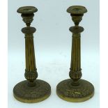 A pair of Empire brass candlesticks 26cm (2).