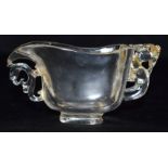 A small Chinese glass libation cup with a beast handle. 6cm