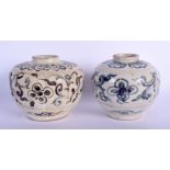 TWO 17TH CENTURY SOUTH EAST ASIAN BLUE AND WHITE JARLETS painted with flowers. 9 cm x 7 cm. (2)